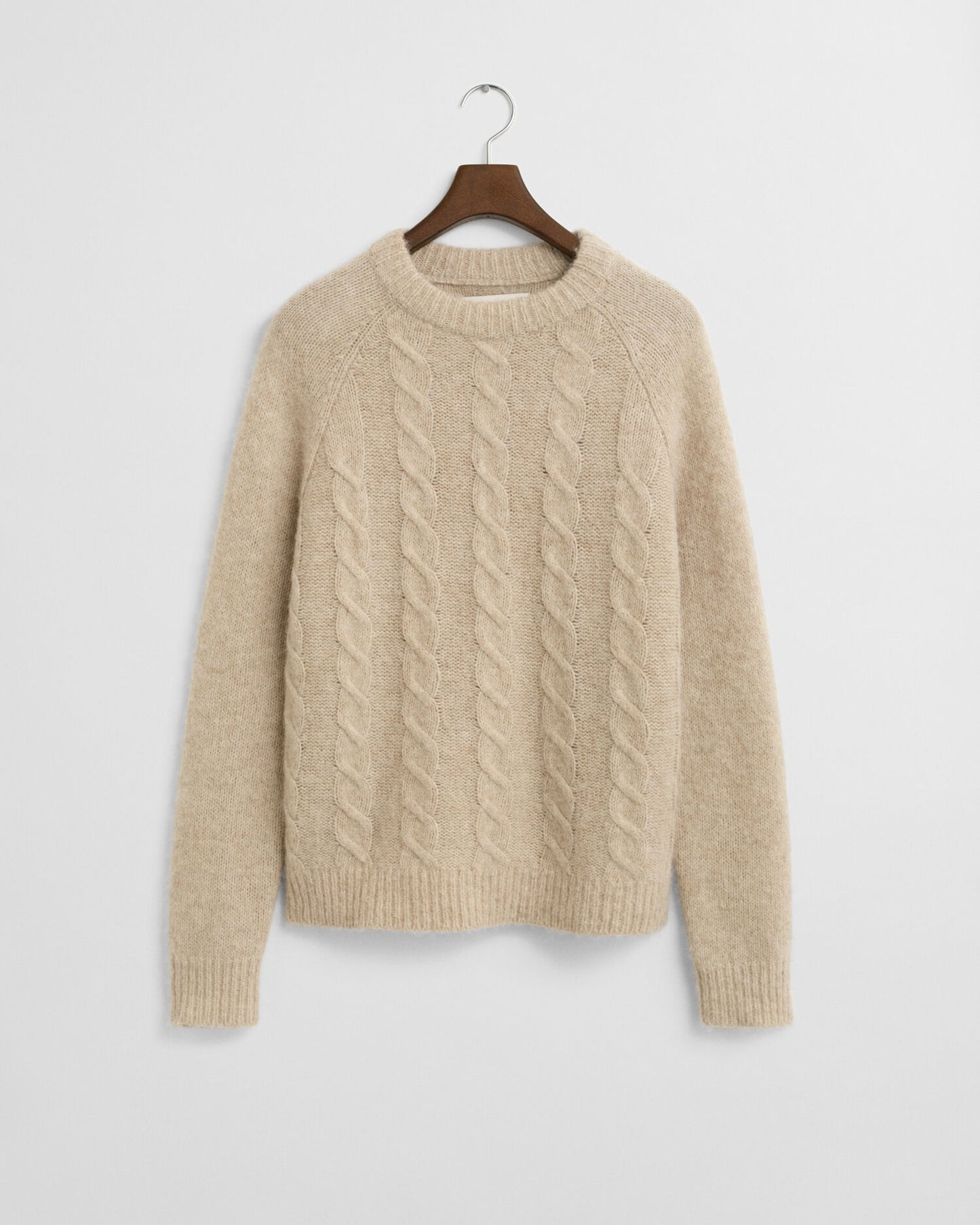 Pull ras du cou en maille torsadée