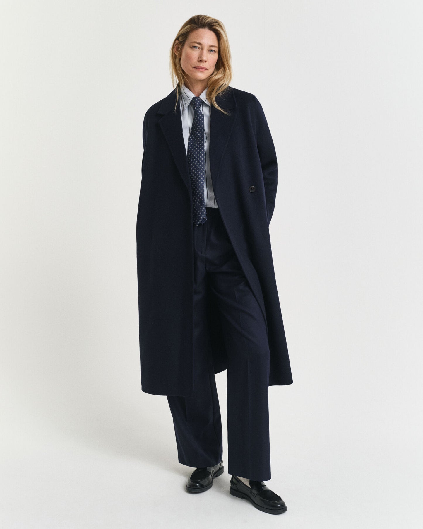 Manteau ceinturé cousu main